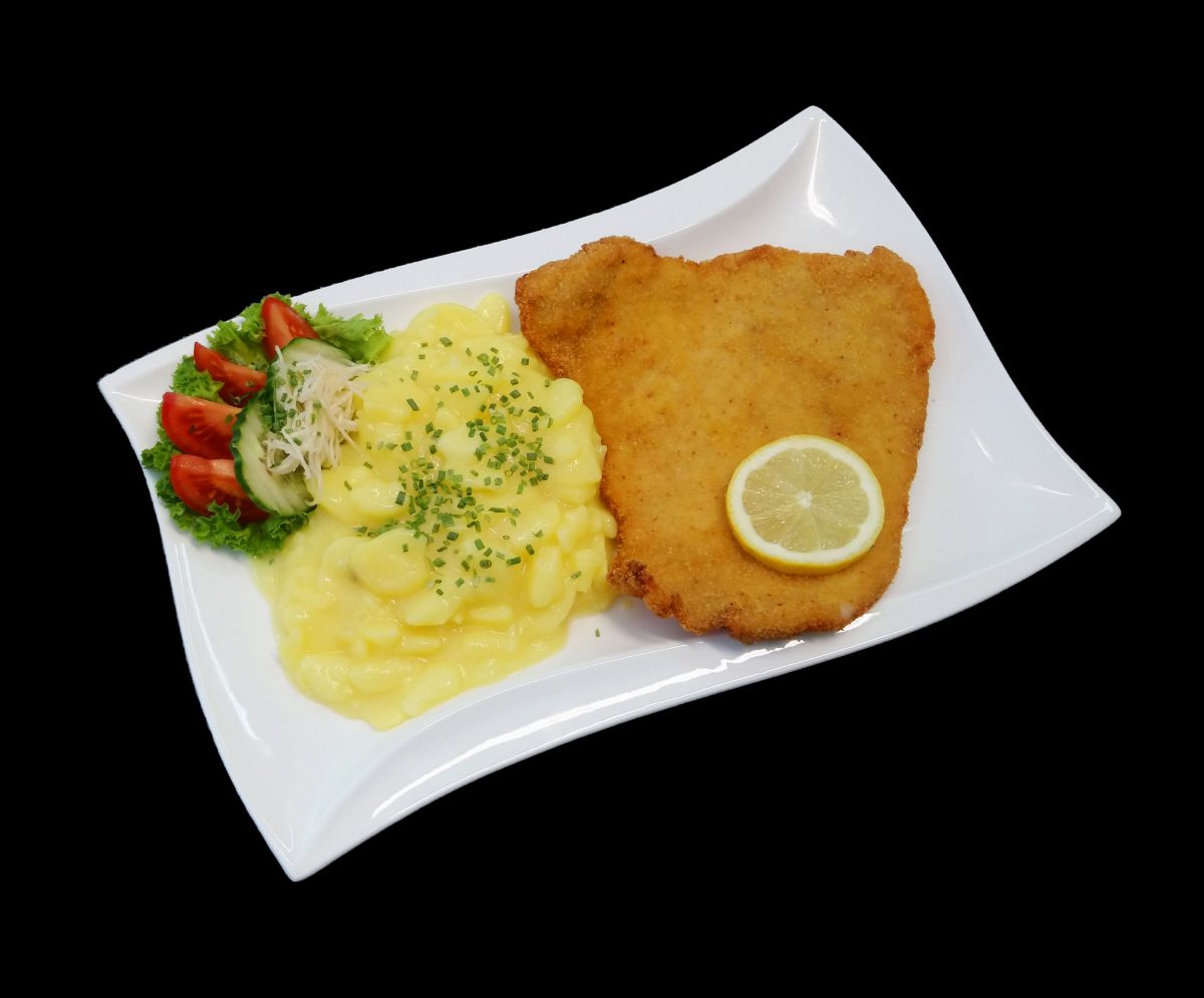 Schweinebraten vom Karree mit Sauerkraut und Semmelknödel